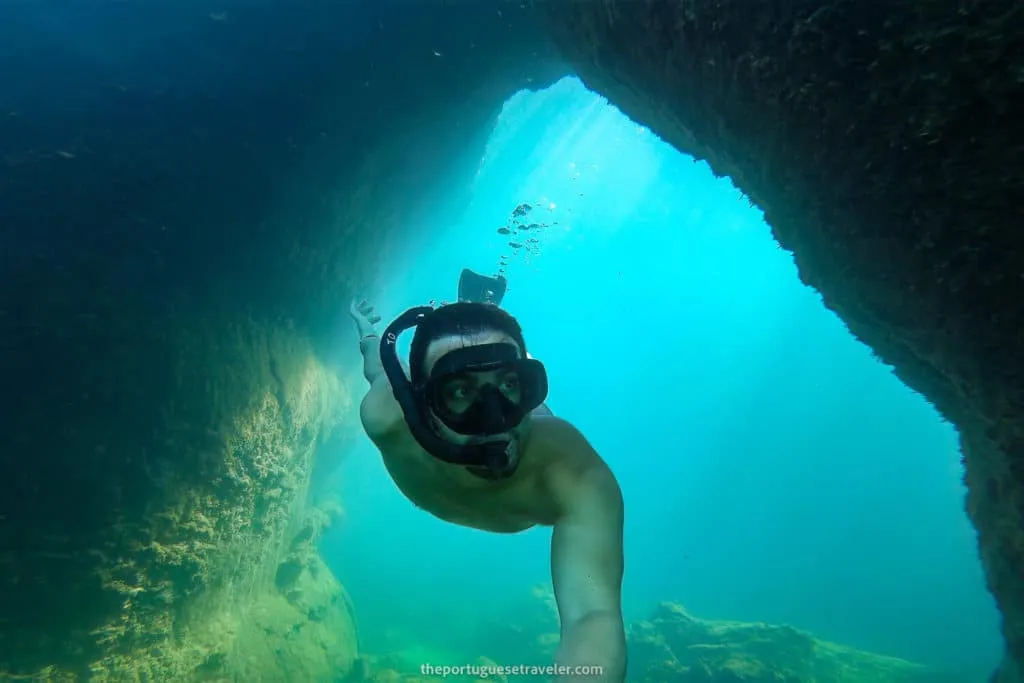 Me exploring the underwater passages in Los Túneles tour, Isabela, Galápagos