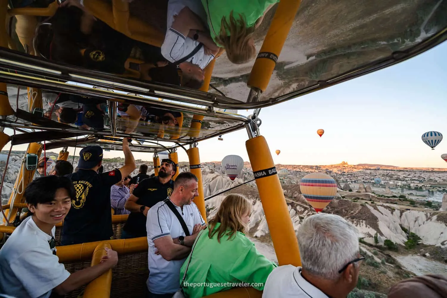 Our balloon in the air, and the group taking photos and watching the show
