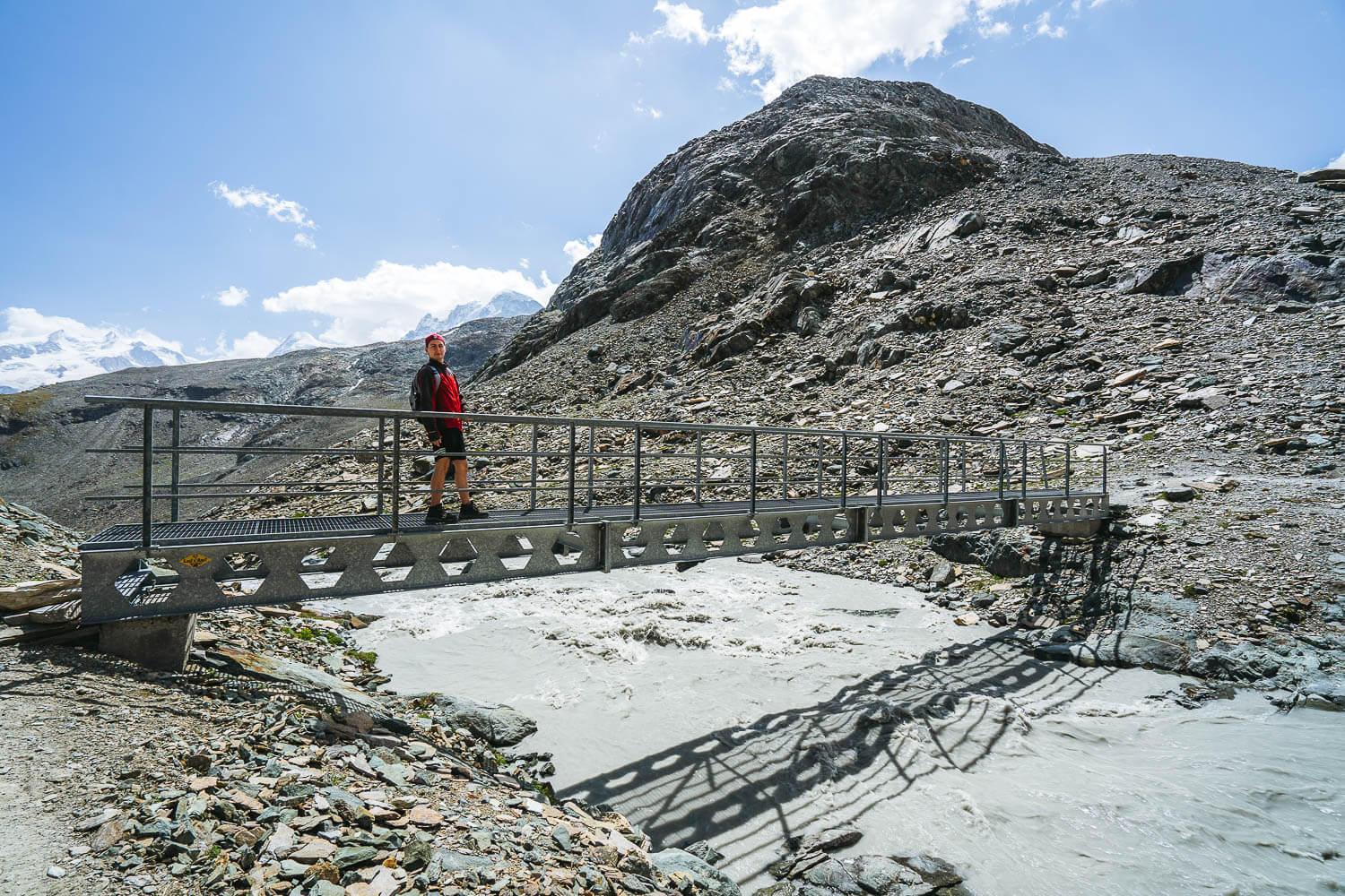Bridge crossing a glacier river at the Matterhorn Glacier Trail