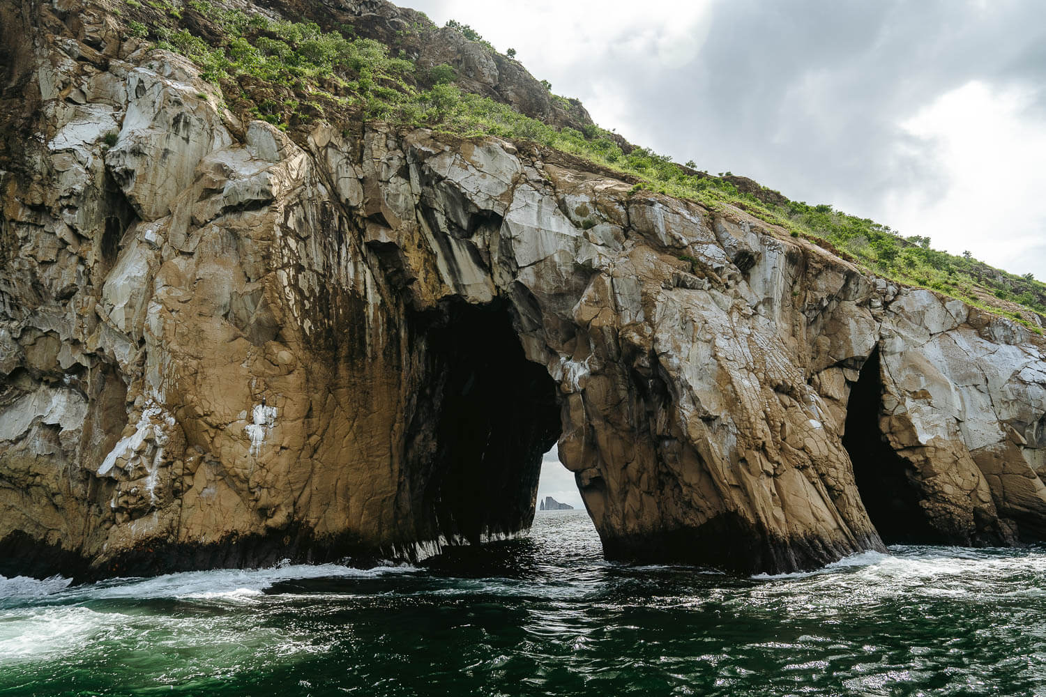 View to Kicker Rock from a hole in the Cerro Brujo on the 360 Tour