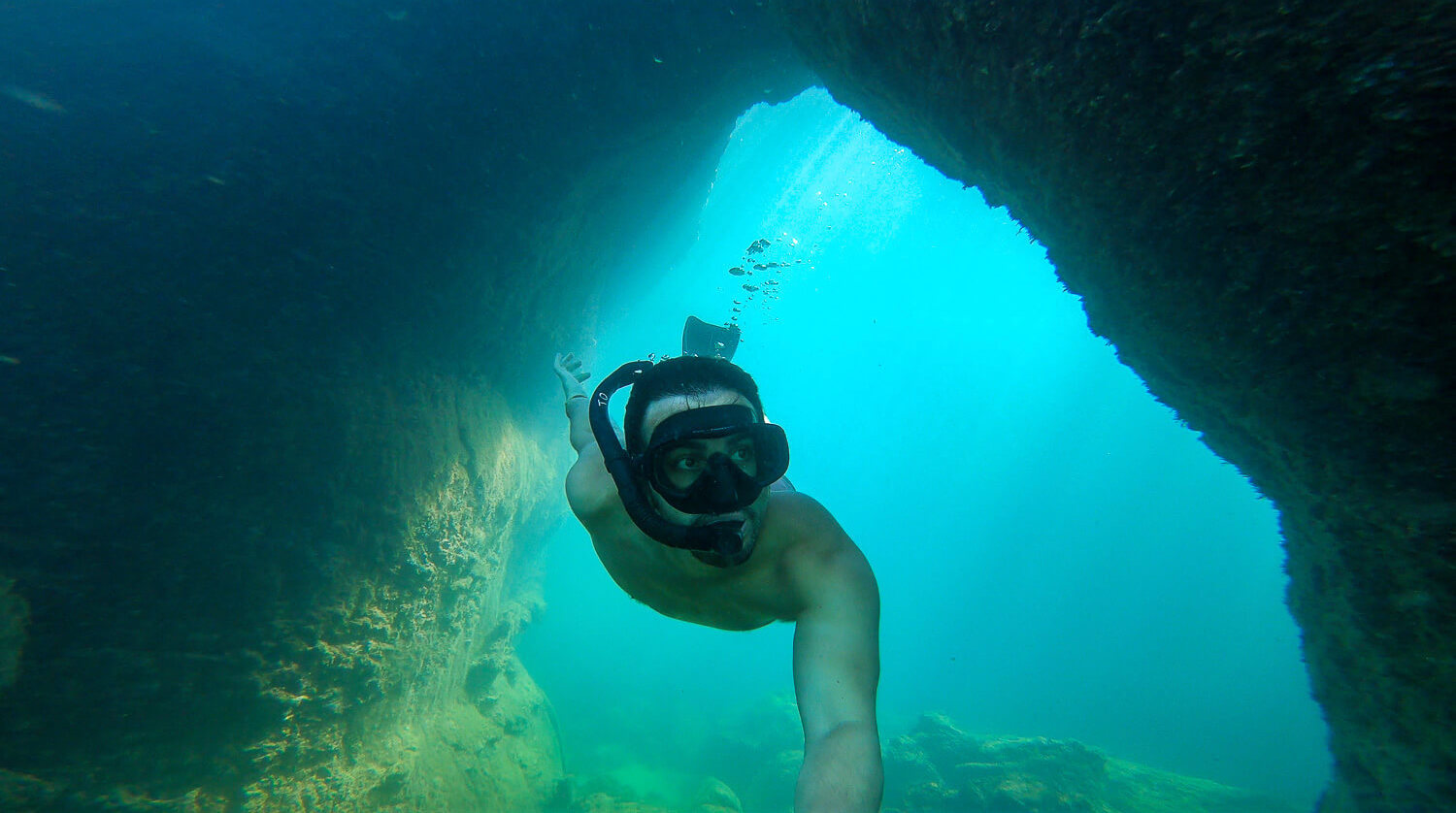 Me exploring the underwater passages in Los Túneles tour, Isabela, Galápagos