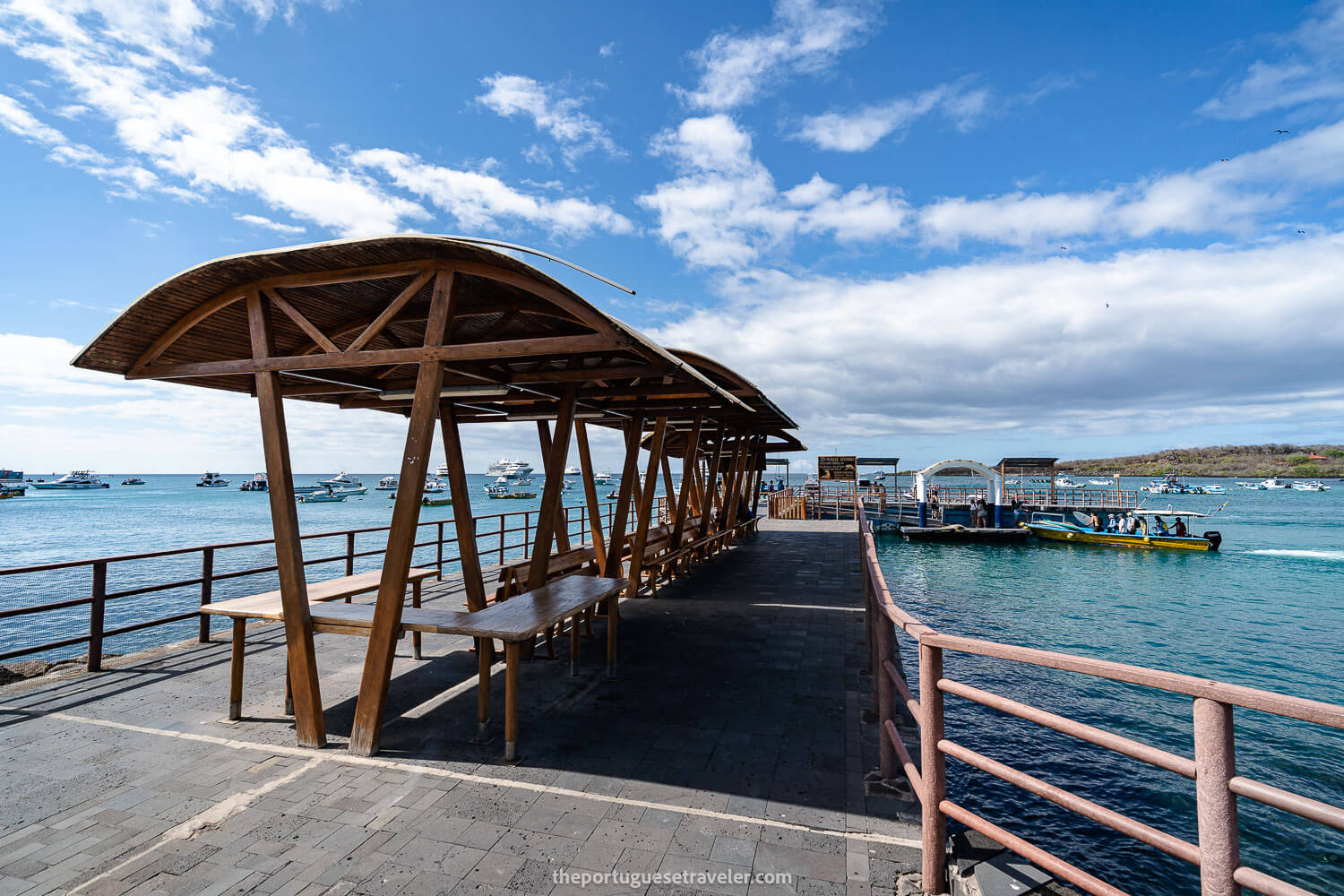 The Muelle Acuario pier with a taxi-boat