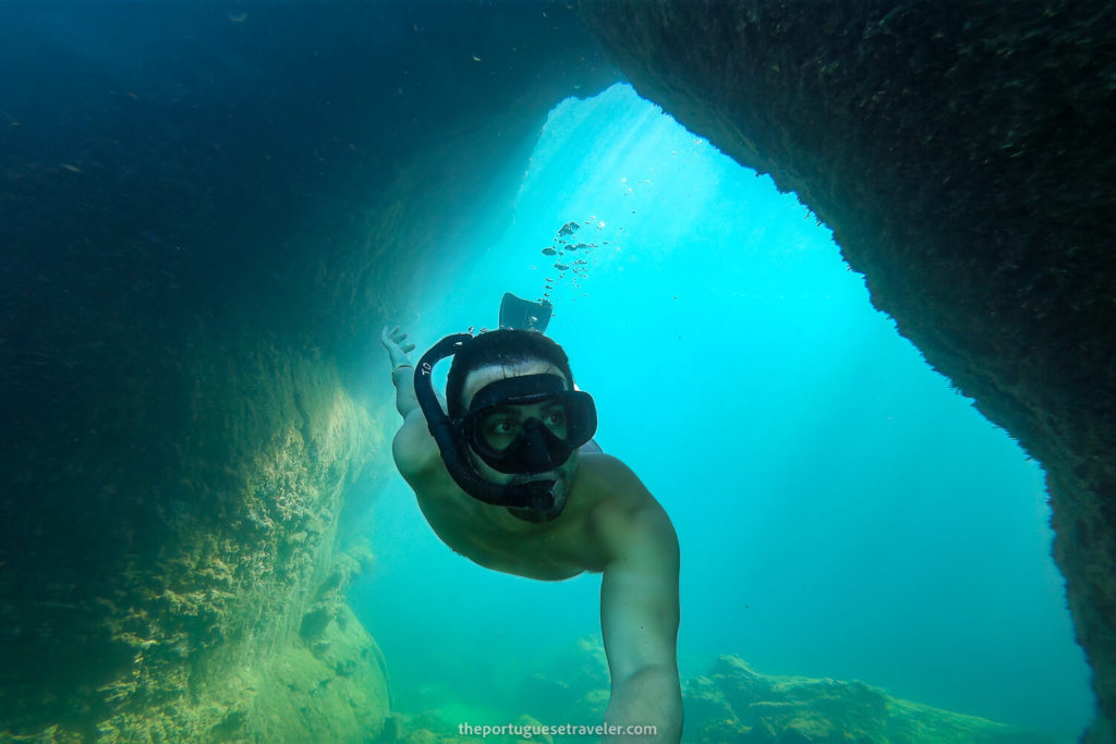 Me exploring the underwater passages in Los Túneles tour, Isabela, Galápagos, one of the best Galápagos Islands tours.