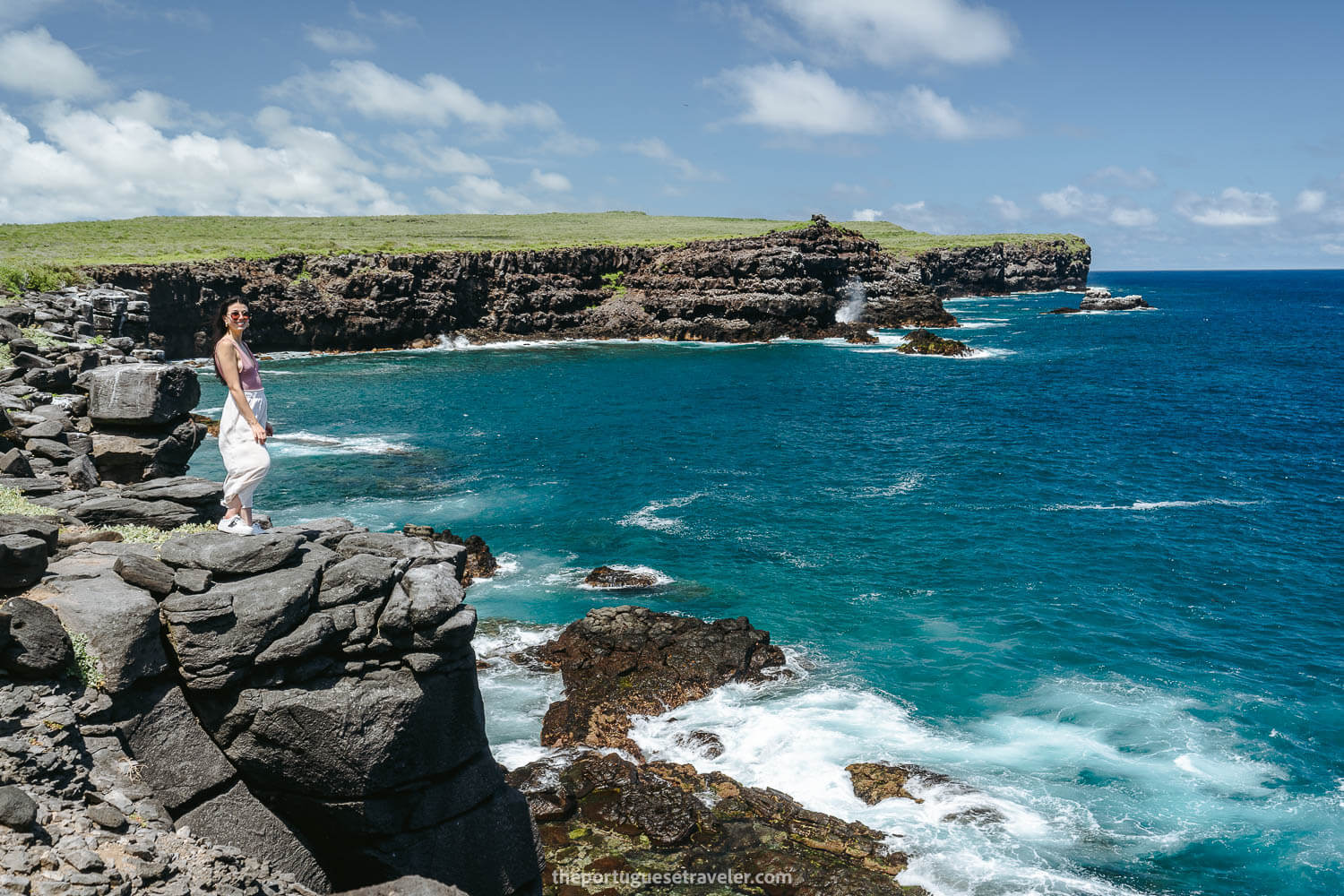 Jhos on the cliff on the Espanola Island Tour