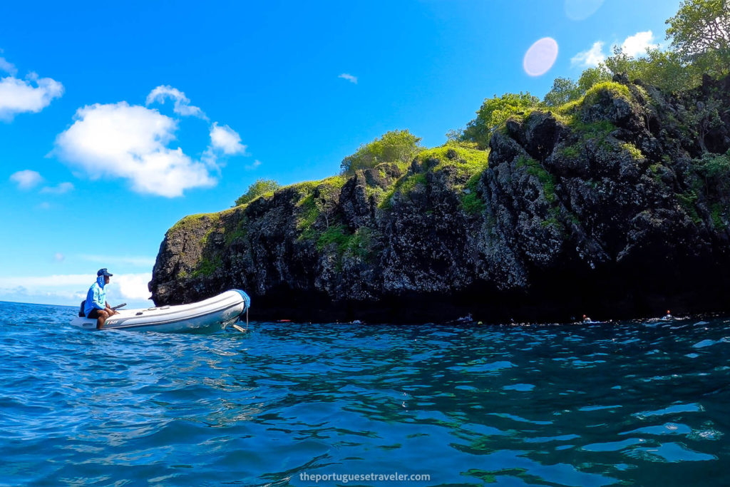 The rubber boat surrounding us while snorkeling on the Espanola Island Tour