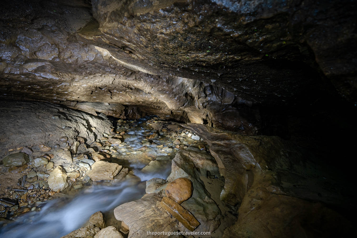 The river flowing inside the cave