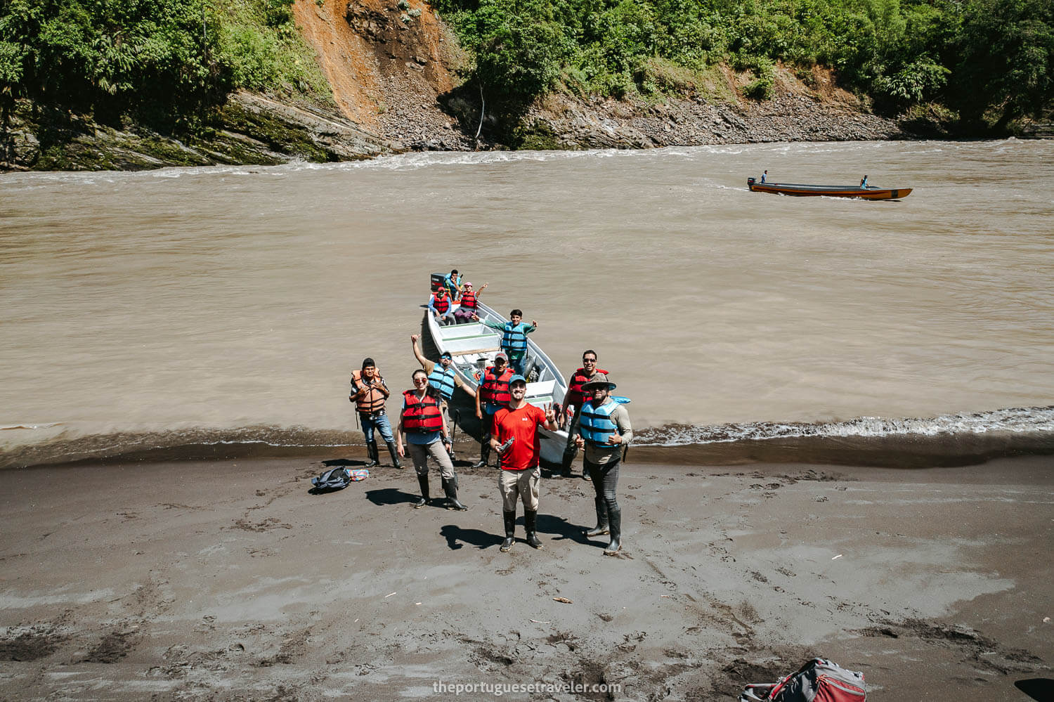 The entire group almost departing by boat through the Amazon Jungle, on the Cueva de Los Tayos expedition.