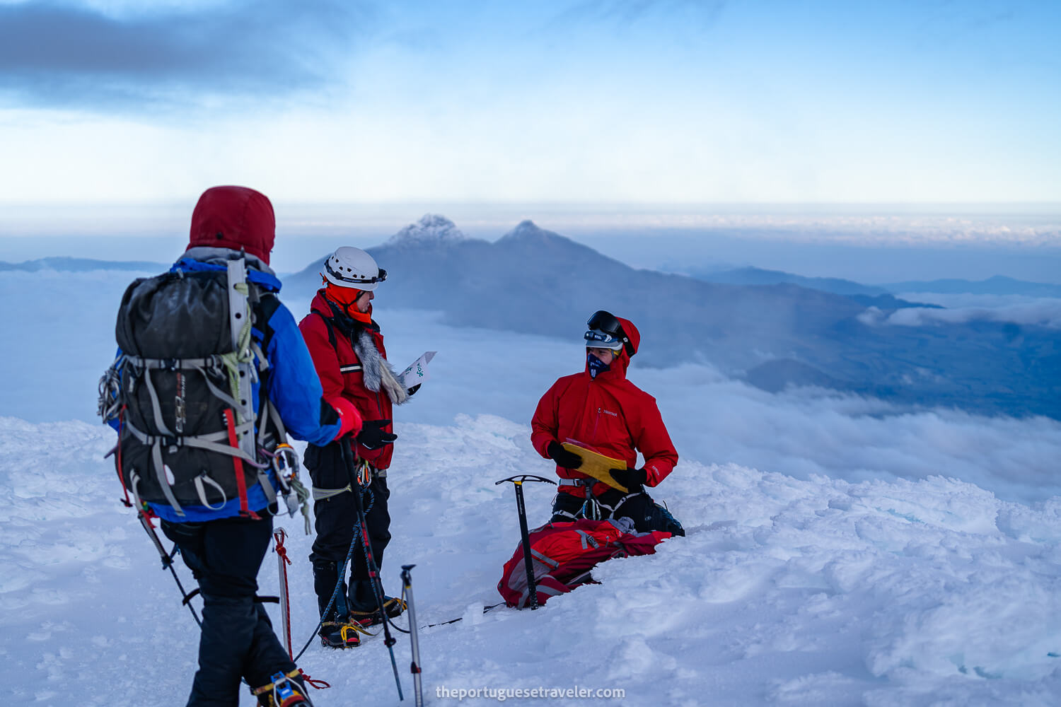 The first group at the summit all geared up, Iliniza Volcanoes in the background