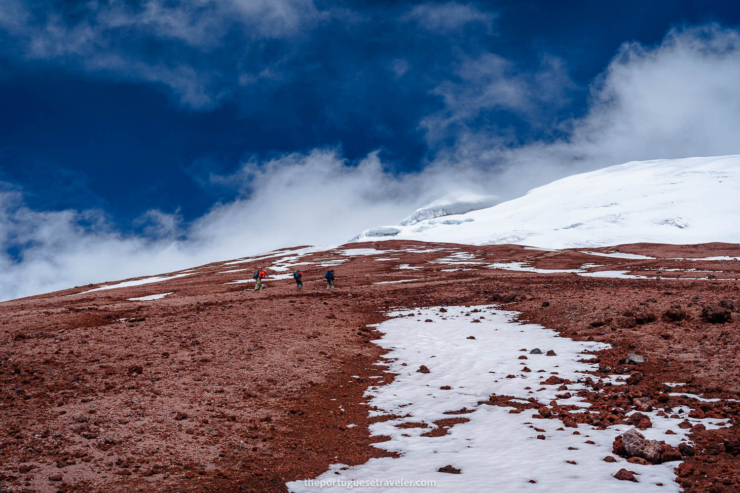 Some hikers trying to reach the snow section