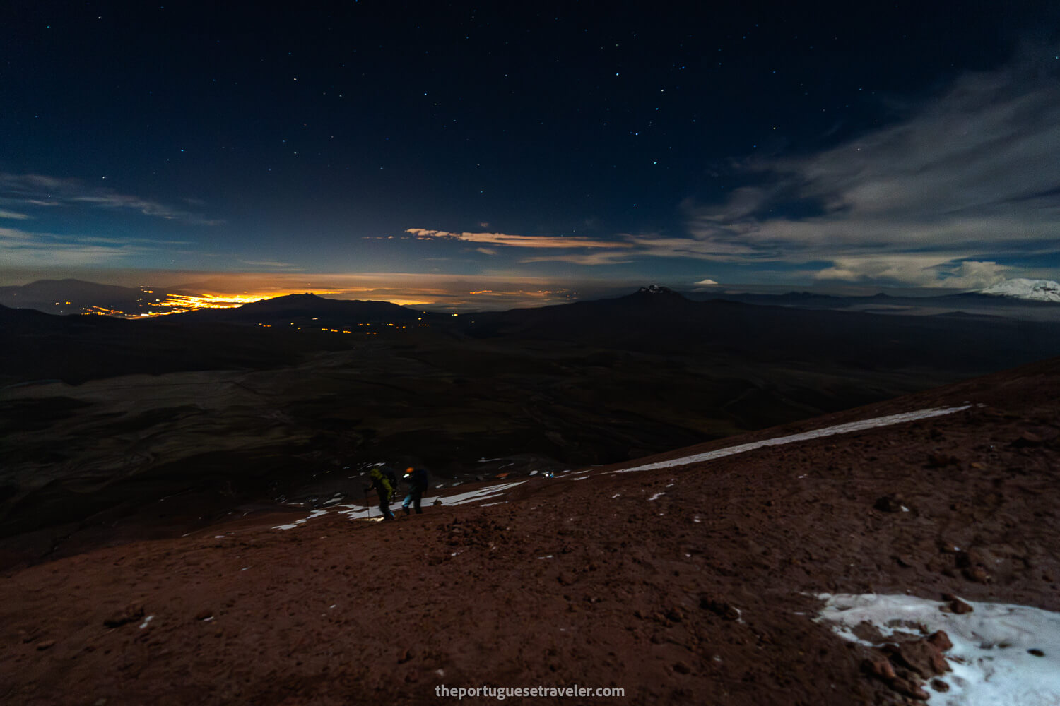 The first snow on the climb, Quito illuminated in the back