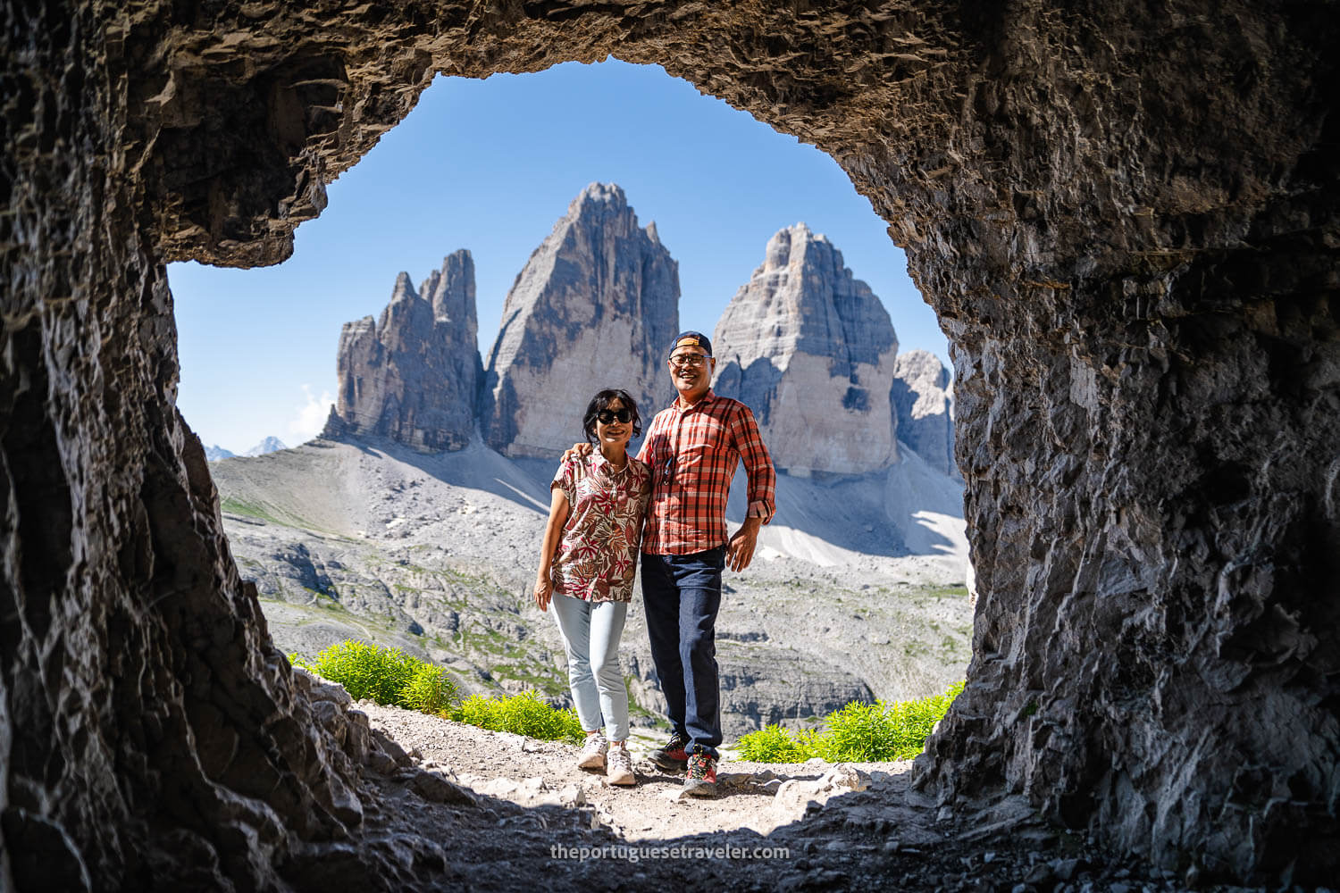 A couple posing at Tre Cime Grotte