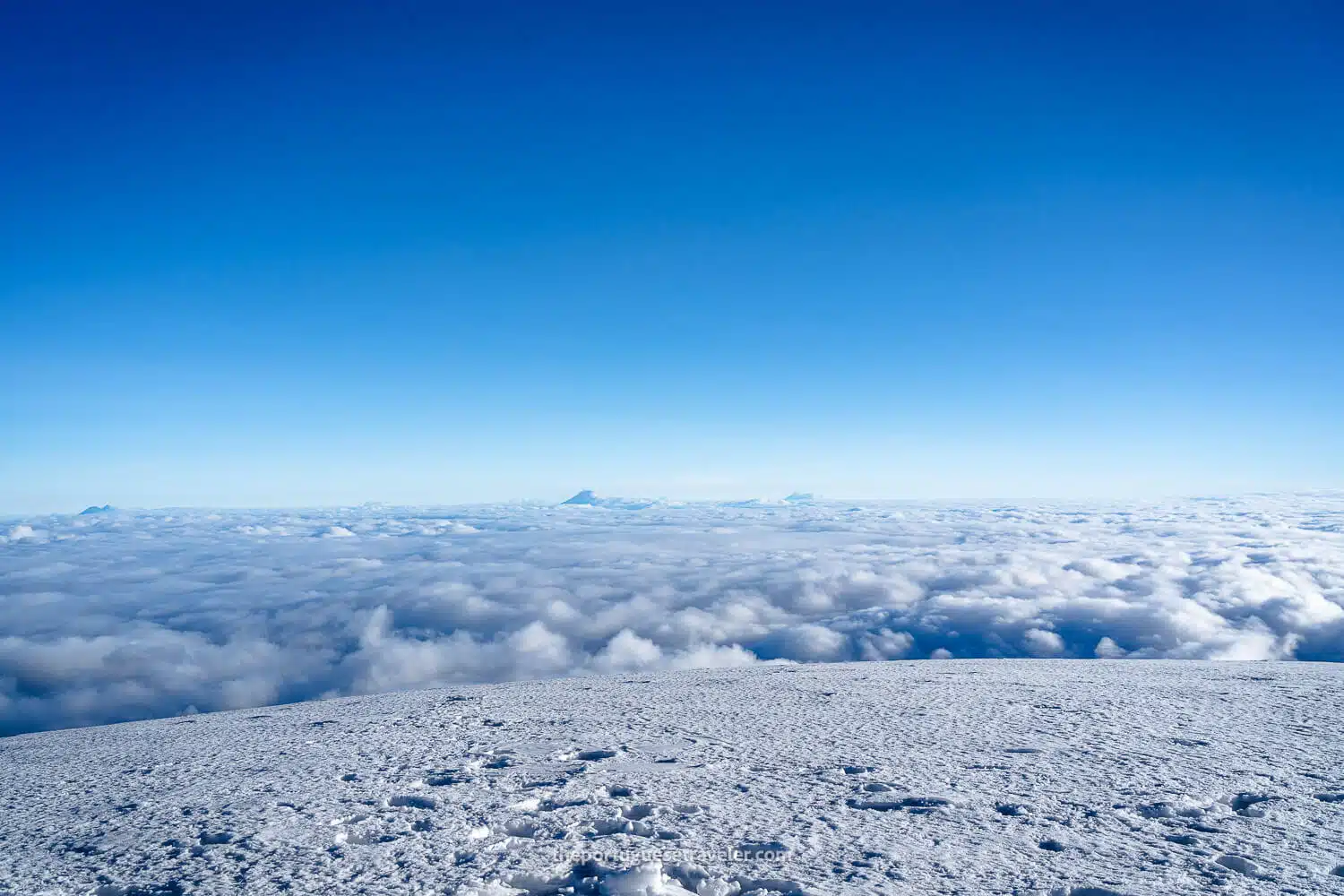 Cotopaxi Antisana and Cayambe with a cloud inversion on the summit of Chimborazo Volcano