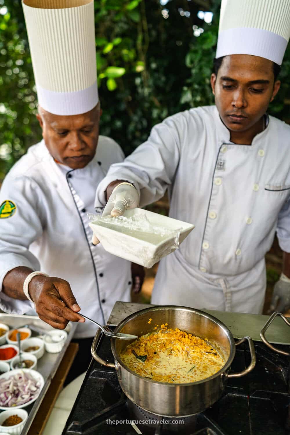 The Coconut Milk being placed in the Dahl recipe