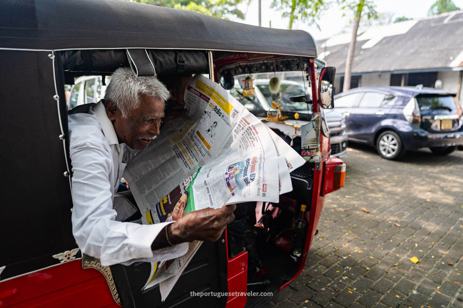 A local inside a tuktuk at the Court Square in Galle, Sri Lanka