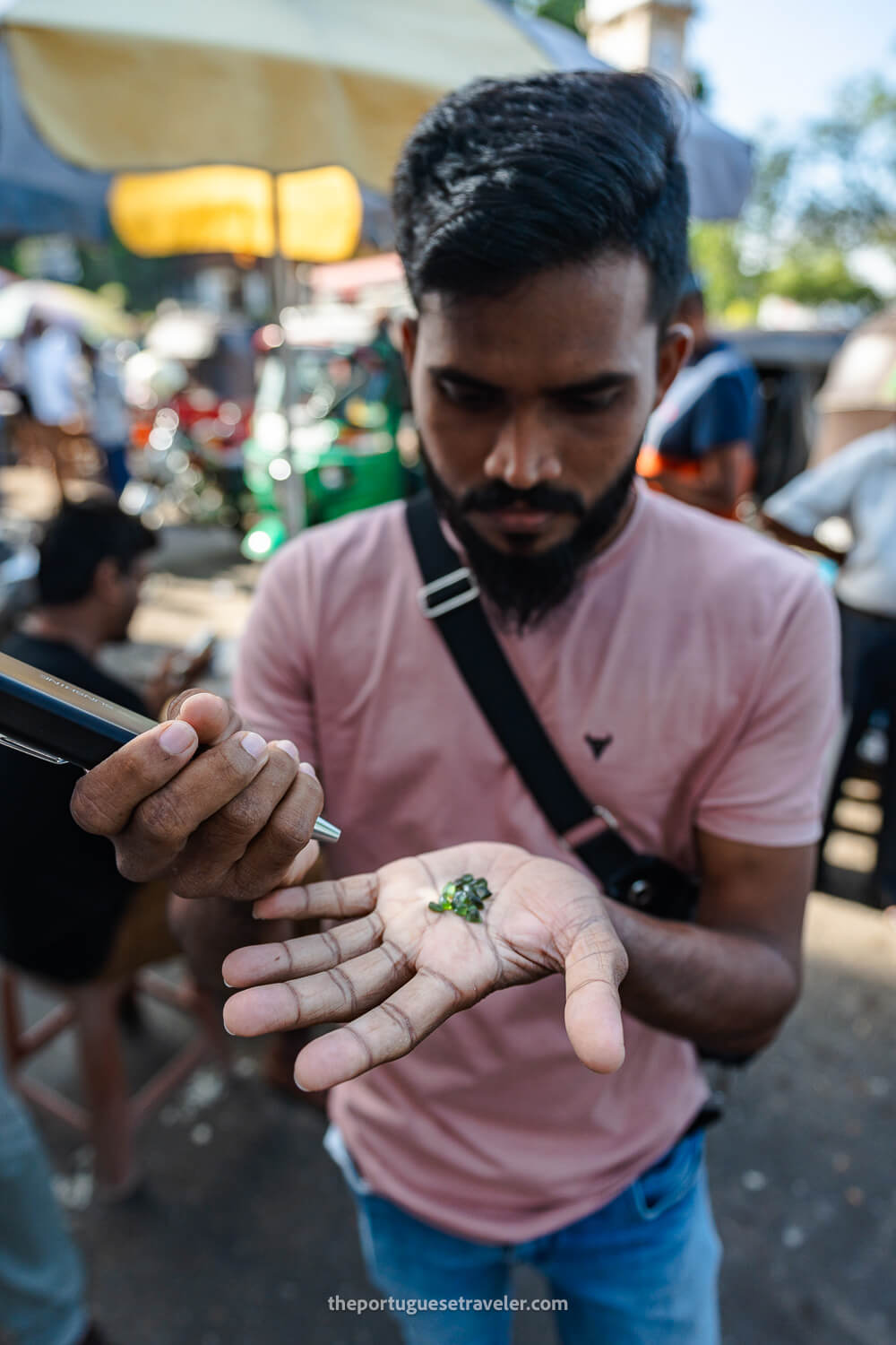 A gem vendor showing me his stones