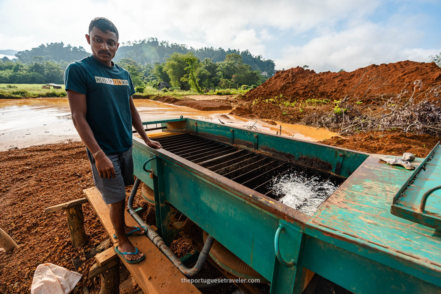 A miner with his water-filtering machine