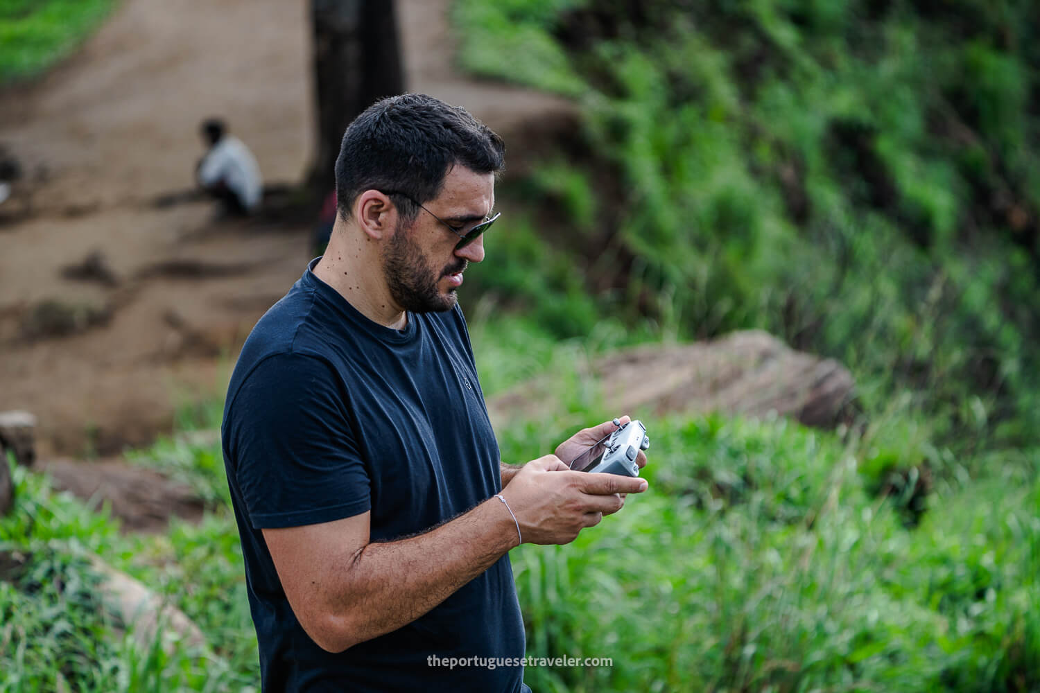 Ricardo flying his drone at the Little Adam's Peak summit