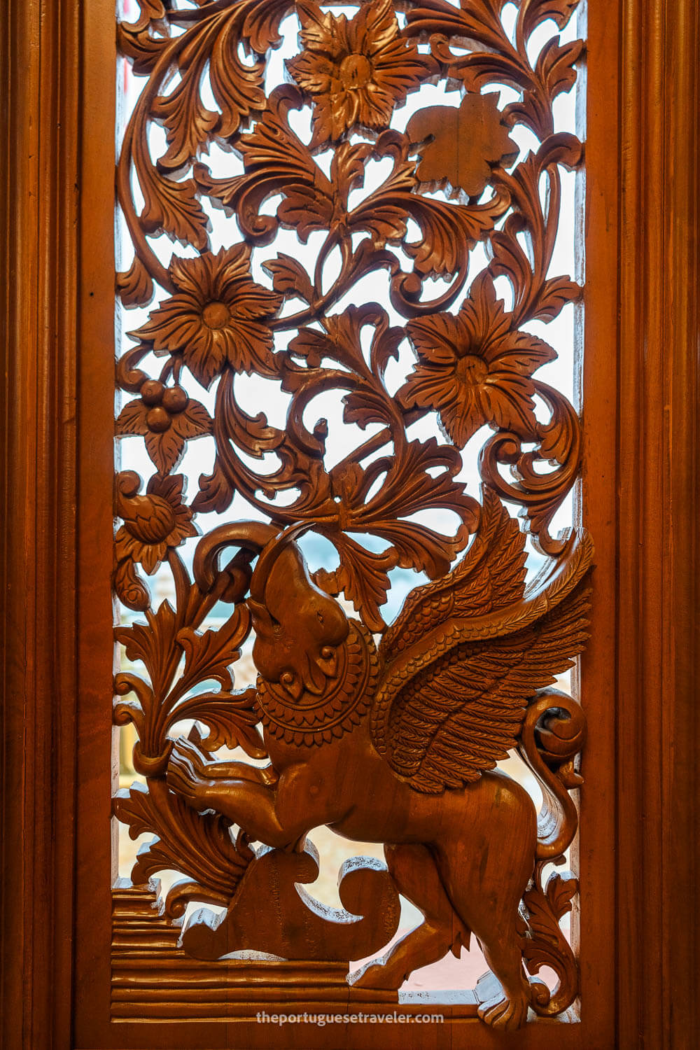 The wooden carvings on the windows of the temple