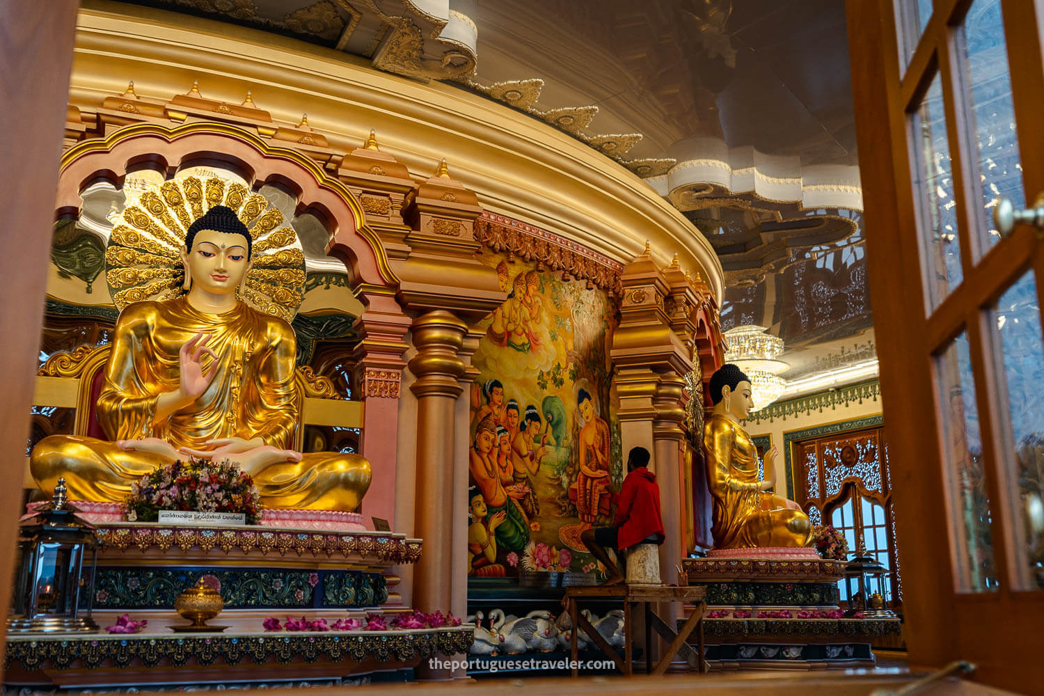 An expert doing his finishing touches of the interior paintings of the temple