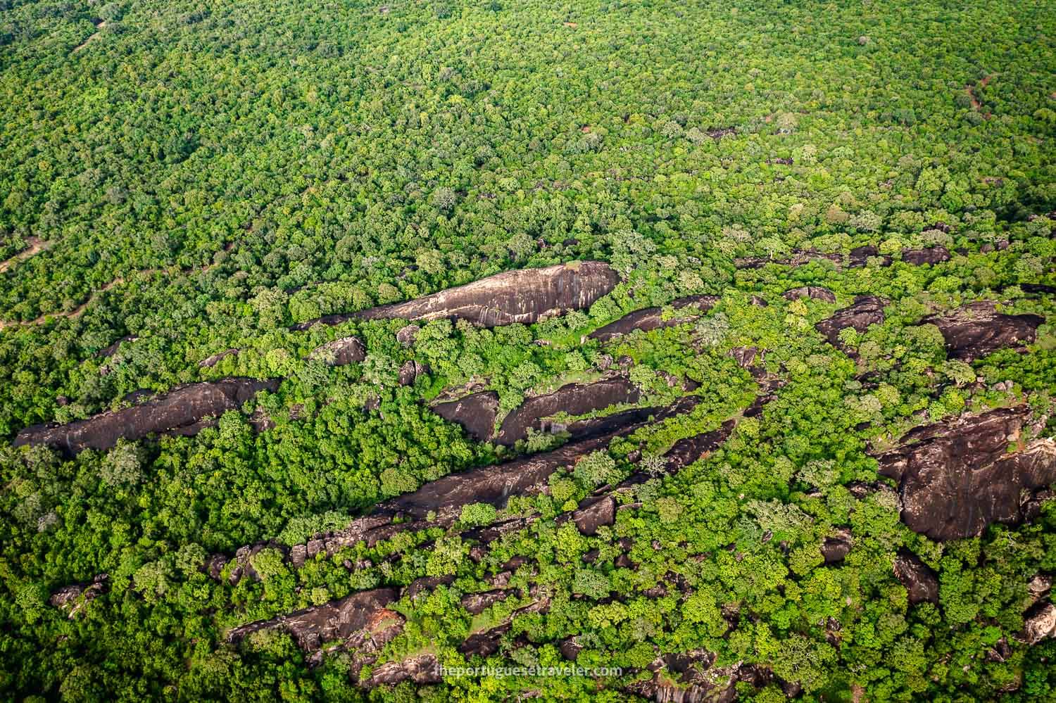 A Top-Down drone photo of the rocky landscape around the Sithulpawwa Temple