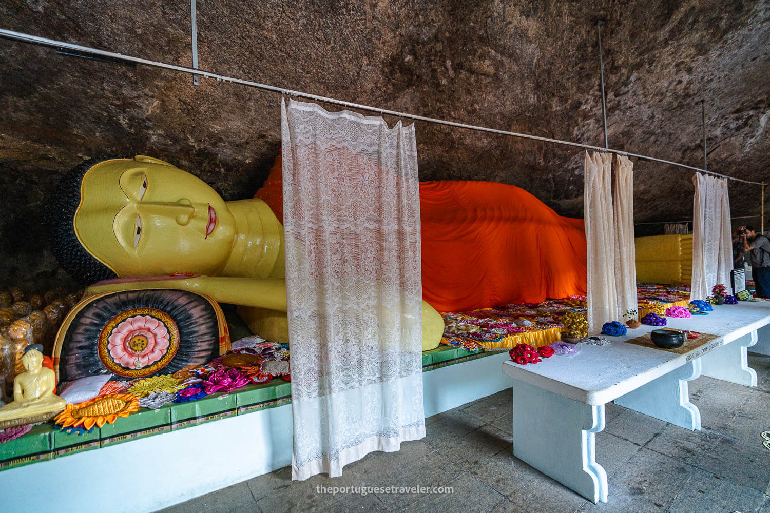 The reclining Buddha inside the hidden temple at Sithulpawwa