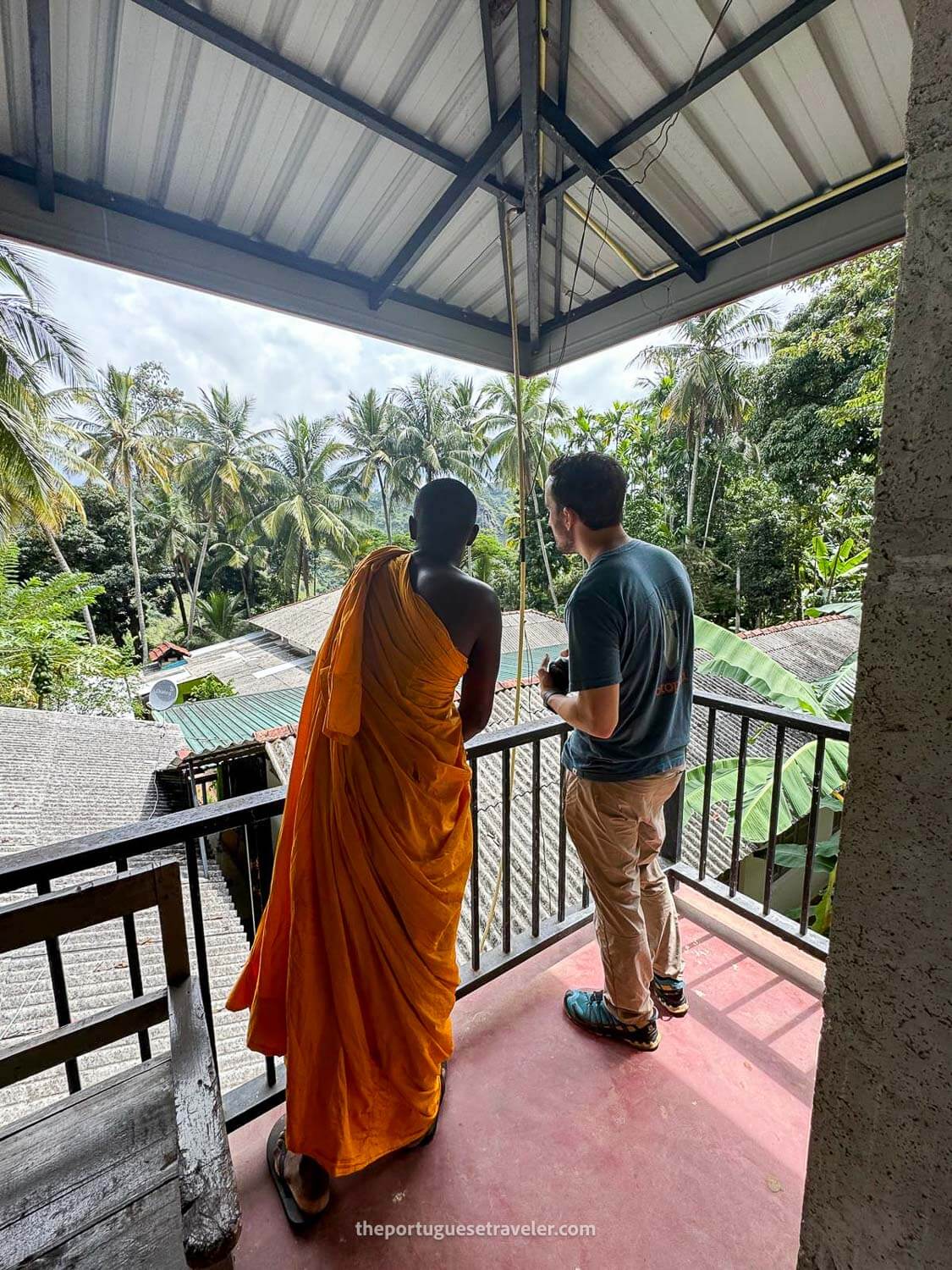 Me being converted by a monk at the teahouse underneath the Ravana's Cave