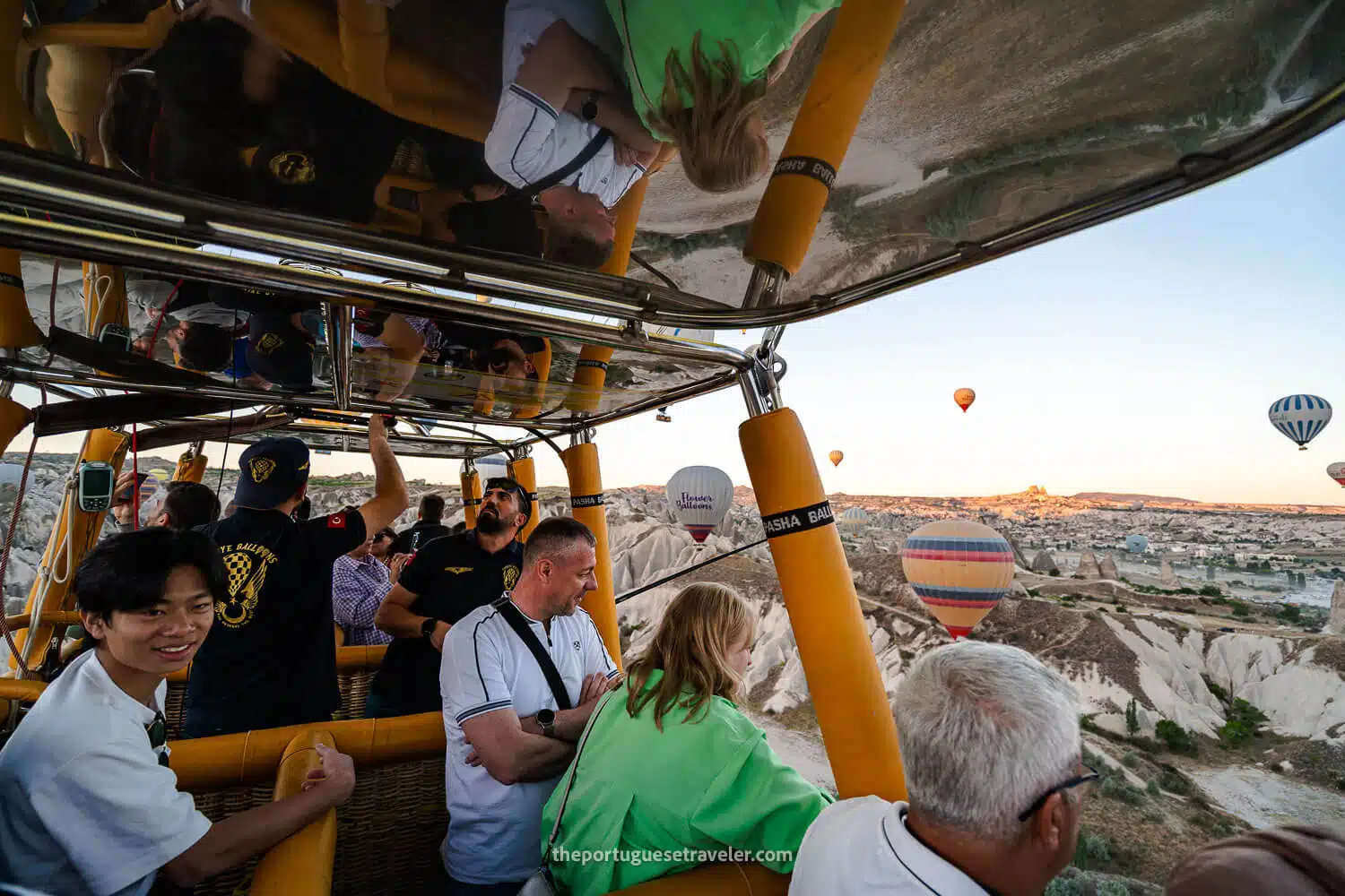 Our balloon in the air, and the group taking photos and watching the show