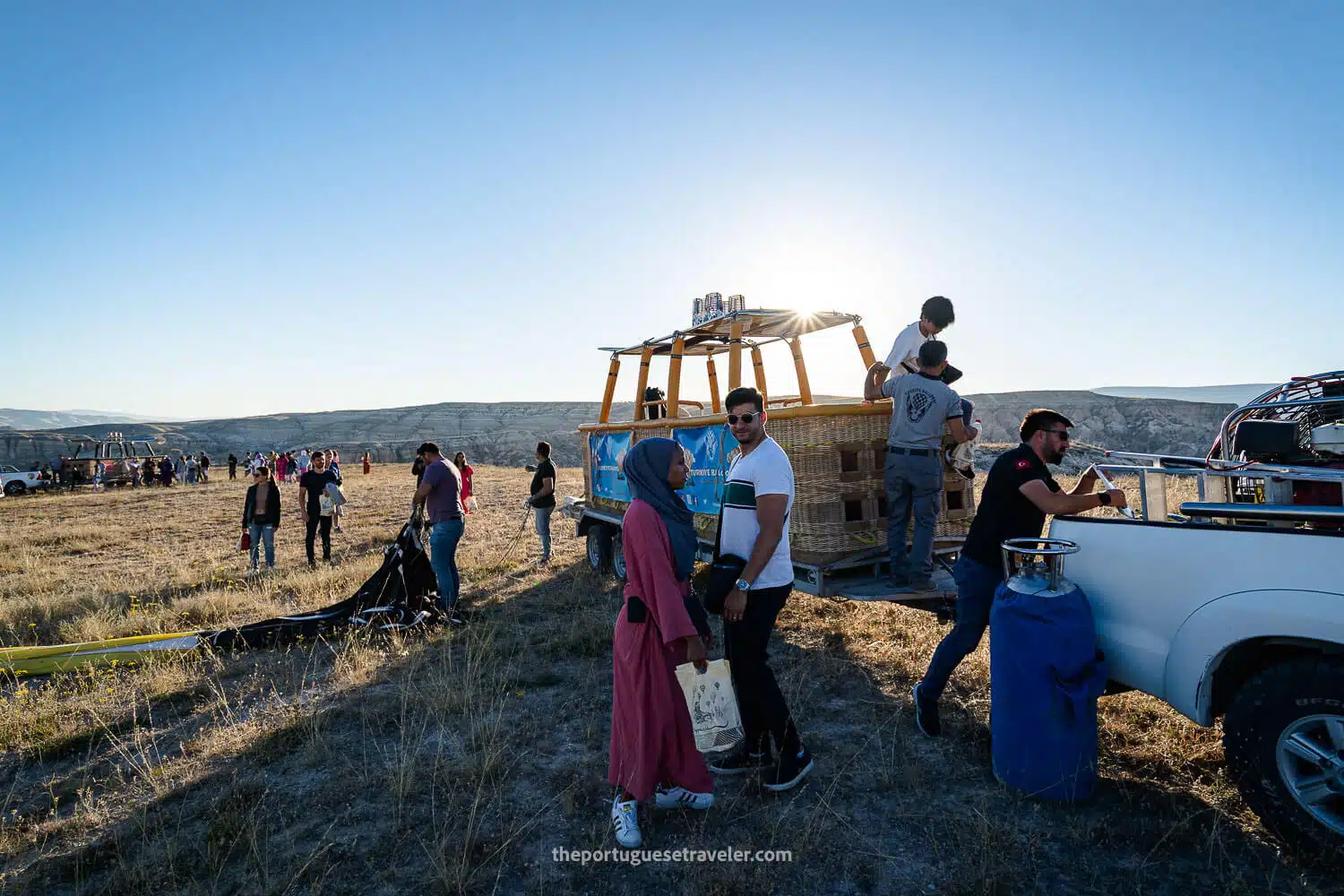 People after the hot air balloon tour dressed in light clothes