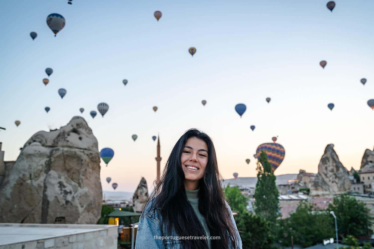 Jhos at Göreme Escape Suites's terrace watching the hot air balloons at sunrise in Cappadocia